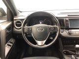 the interior of a car with a steering wheel and dashboard controls