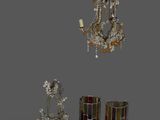 a chandelier and a candle holder on a gray background