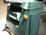 a machine that is sitting on a pallet in a warehouse