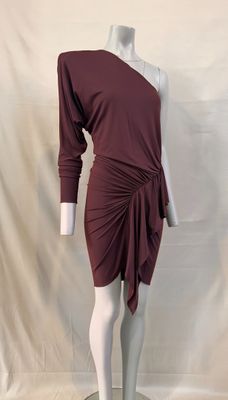 the mannequin is wearing a maroon dress with a long sleeve