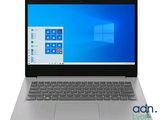 gros plan d'un ordinateur portable sur une surface blanche