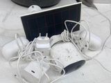 a lot of wires and a solar panel on the table