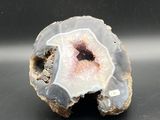 a picture of a piece of rock with a hole in it