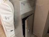 an image of a safe deposit cabinet in a basement