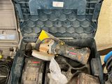 a tool box with tools on a table next to other tools