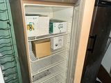 an open refrigerator with a lot of food inside of it