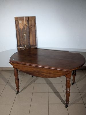 a wooden table with a book on top of it
