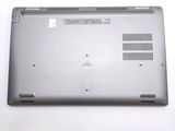 a laptop that is sitting on a white surface