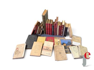 a lot of books that are sitting on a table