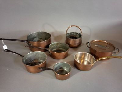 many pots and pans that are on the table