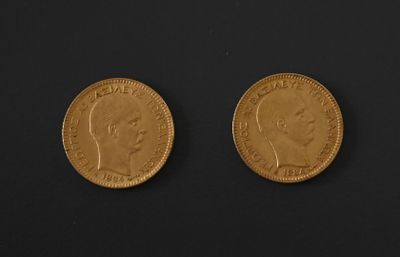 two gold sovereigns, one of which is a sovereign and the other of which is a sovereign