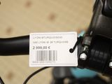a label on the handlebars of a bicycle