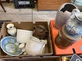 a box full of different types of vases and bowls