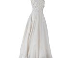 the back of a white wedding dress on a mannequin mannequin mannequin mannequin mannequin mannequin mannequin manne