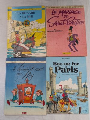 Quatre livres pour enfants, en français et en anglais, sont posés sur une table