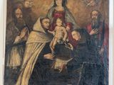 an old painting of a family with a baby in a room