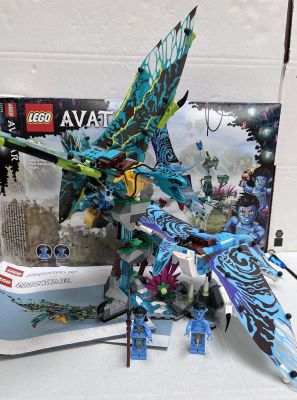 a box of legos with a dragon and a box of legos
