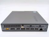 the back view of a small computer with two ports on top of it
