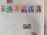 a book with stamps on it and a calendar on the cover