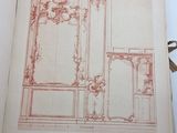 a drawing of a room in a book on a table