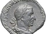 une pièce d'argent sur laquelle figure un homme coiffé d'un turban