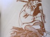 a drawing of a man sitting on a pile of hay