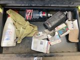 a tool box with a lot of items inside of it