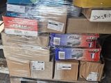 a stack of boxes on a pallet in a warehouse