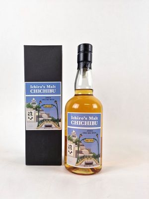 an image of a bottle of whisky next to a box