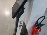 a fire extinguisher next to a fire extinguisher on the floor