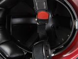 the helmet is red and black with a black strap