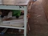 a table with a bunch of items on it in a room