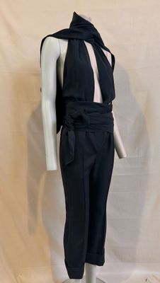 an image of a mannequin wearing a black jumpsuit
