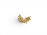 an 18k gold and diamond leaf broochle