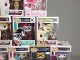 a lot of pop vinyl figures on display in the store