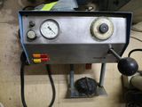 a machine that is sitting on a table in a room