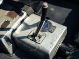 a silver suitcase sitting on the seat of a car