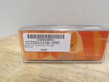 a close up of a plastic container with a barcode on it