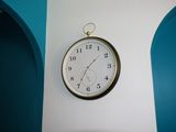 a clock that is hanging on the wall in the room