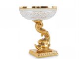 an image of a gold and glass bowl with a snake on it