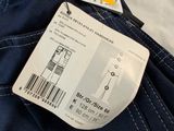 the label on the back of a pair of blue jeans with a barcode on it
