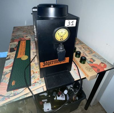 a coffee machine sitting on a table with a clock on it