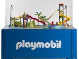 un Playmobil avec un toboggan et un toboggan aquatique à l'intérieur