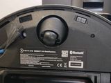a close up view of a printer with a blue handle