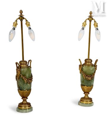 pair of green and gold urn lamps with glass shades