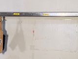 an image of a garage with tools hanging on the wall