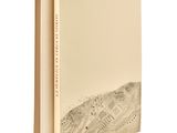 an open book with a drawing of a mountain on it
