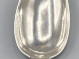 a spoon that is sitting on a table
