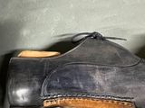 a close up of a pair of shoes on a table