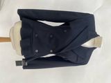 a black jacket and pants on a mannequin mannequin